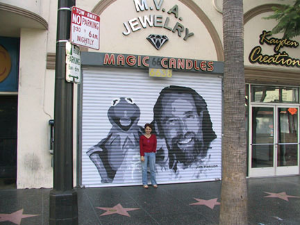 Artist Susan Krieg in front of Jim Henson door