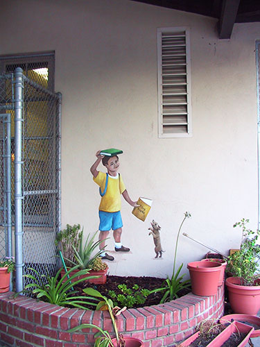 Boy with Kite Mural in School Courtyard